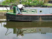 Painting a barge at Crooke