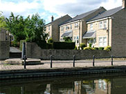 Houses and cannon at Apperley Bridge