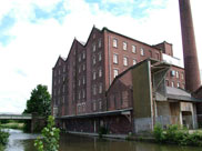 Old factory and chimney on the canal