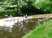 3 canoeists on the canal
