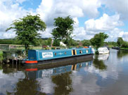 A 'green' narrow boat with a wind generator